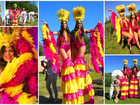 Copacabana Steltenlopers: Braziliaanse feestvreugde in roze en geel! Dansend op stelten of rollerskates. Boek nu voor een levendig en kleurrijk event!