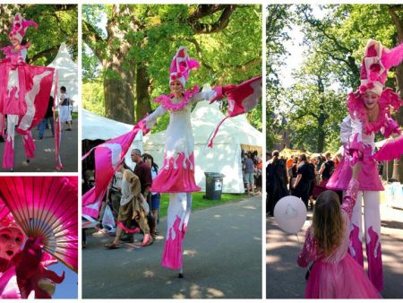 Laat de Prinses in Roze Wit Steltenloper de magie van je evenement verhogen en glimlachen verspreiden waar ze gaat!