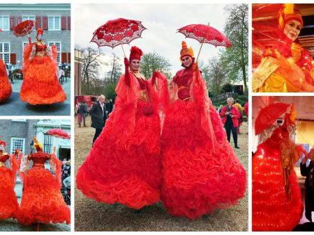 Ervaar betovering met Rode Koninginnen Steltenlopers: LED-gloed, veelzijdig inzetbaar op elk evenement! Boek nu voor vuurrood spektakel!