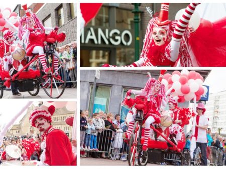 Ervaar het feestplezier van het Rood Witte Driewieler Feest - een kleurrijk en ritmisch avontuur met een clown, een drummer en een danseres op wielen!