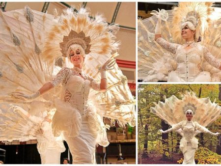 Boek de betoverende Elegante Witte Pauwen Steltenlopers voor jouw evenement. Prachtige parade met verlichte staart, ideaal voor festivals en bruiloften!