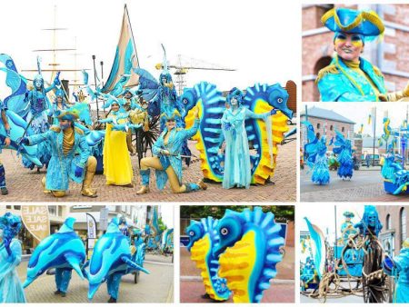 Dompel je onder in de magie van de Parade van Neptunus! Betoverend straattheater en ontvangst entertainment met kleurrijke zeedieren en dansende waterelfjes.